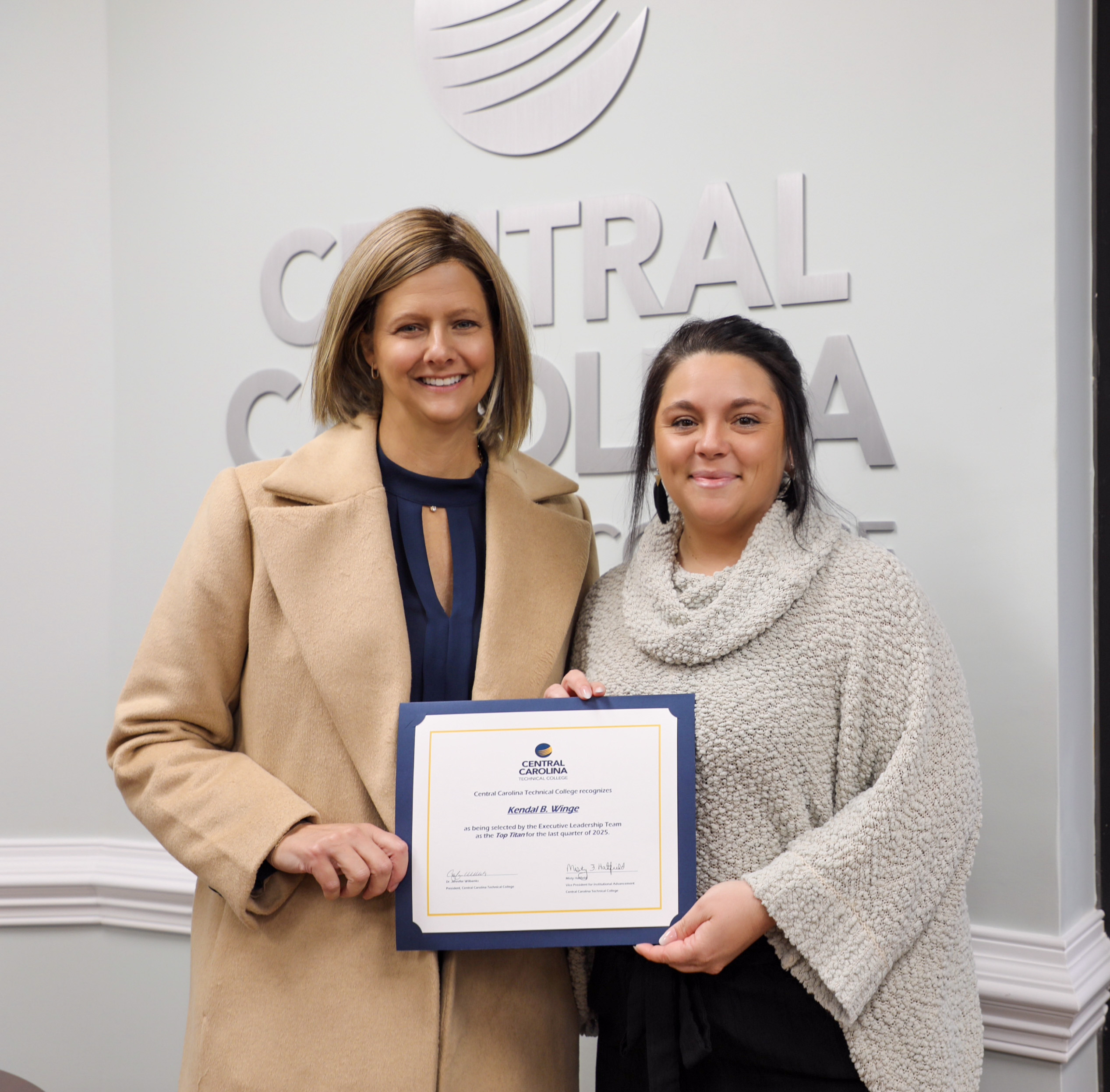 KENDAL WINGE SELECTED AS TOP TITAN FOR FOURTH QUARTER OF 2025 with CCTC president Dr. Jennifer Wilbanks